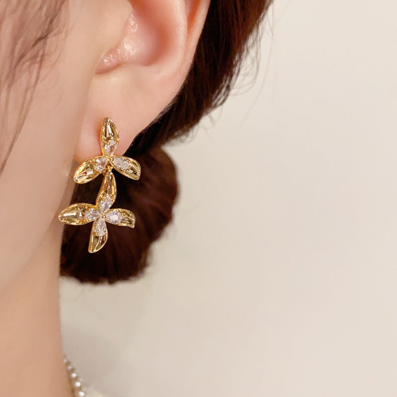Women's Versatile And Fashionable Metal Petal Tassel Earrings