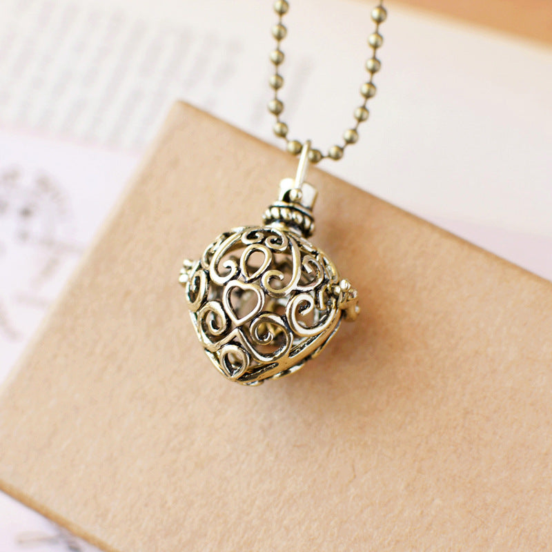 Vintage Heart Hollowed-out Fragrance Ball Pendant Necklace