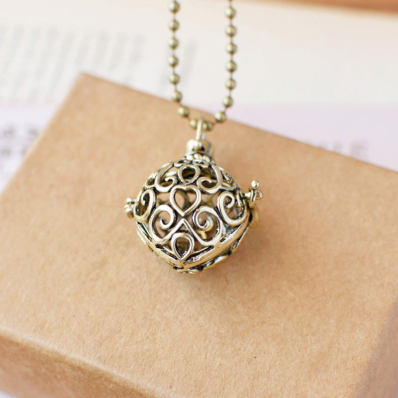 Vintage Heart Hollowed-out Fragrance Ball Pendant Necklace