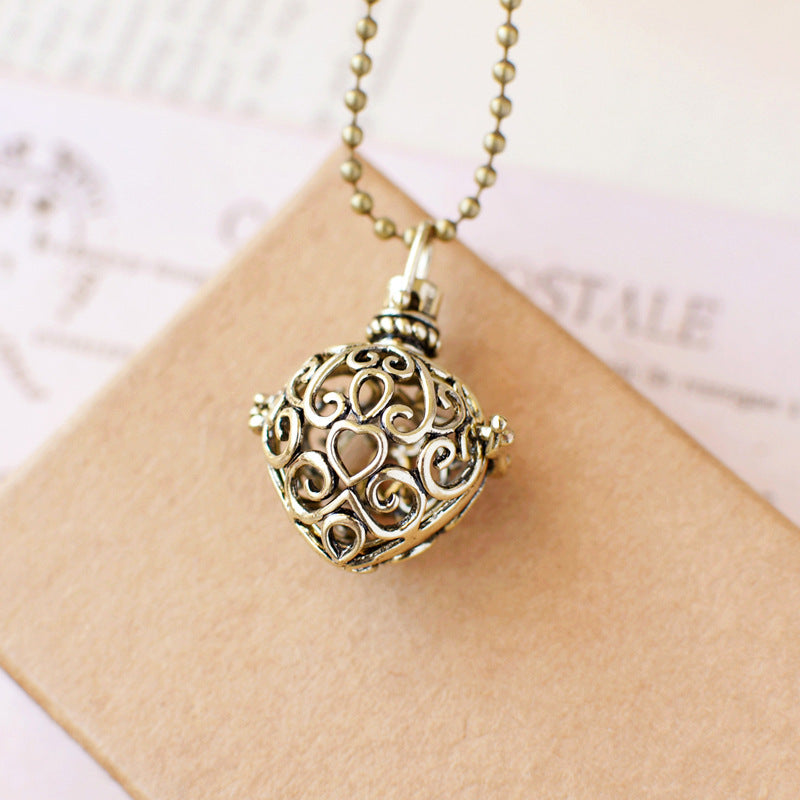 Vintage Heart Hollowed-out Fragrance Ball Pendant Necklace