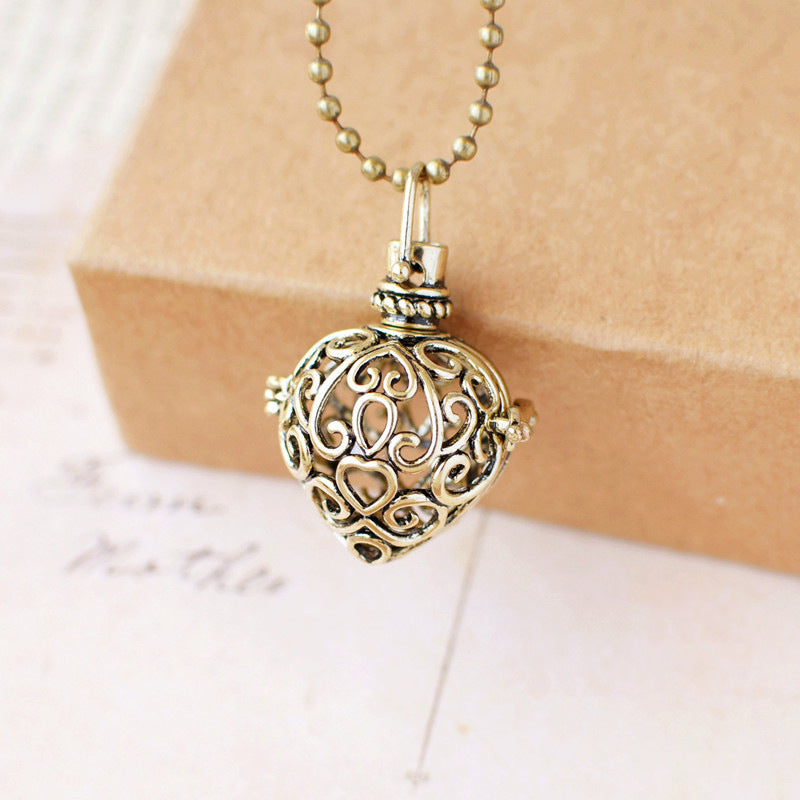 Vintage Heart Hollowed-out Fragrance Ball Pendant Necklace